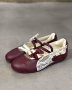 Shop the gorgeous women's Puma Speedcat Ballet Ruby Shimmer shoes at Dolce Shoes. Features a vibrant red shimmering leather upper with a chic elastic strap.